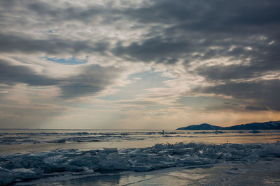 Scenic view of sea against sky during sunset