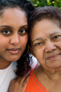 Portrait of a grandmother and granddaughter together