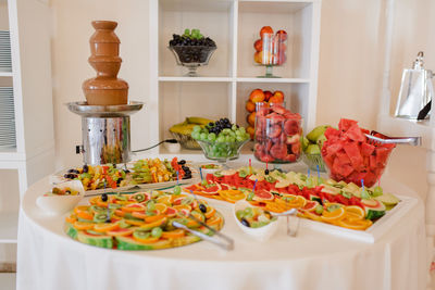 High angle view of fruits in plate on table