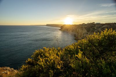 Scenic view of sea against sky during sunset