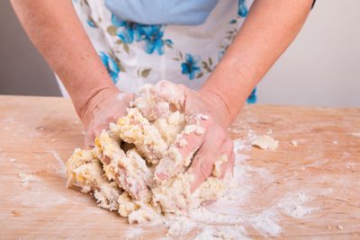 Midsection of woman preparing food