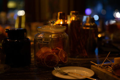Close-up of glass jar on table in restaurant