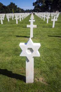 View of cross in cemetery