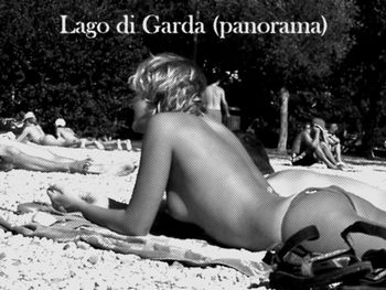 Rear view of woman sitting in swimming pool