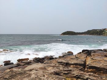 Scenic view of sea against clear sky