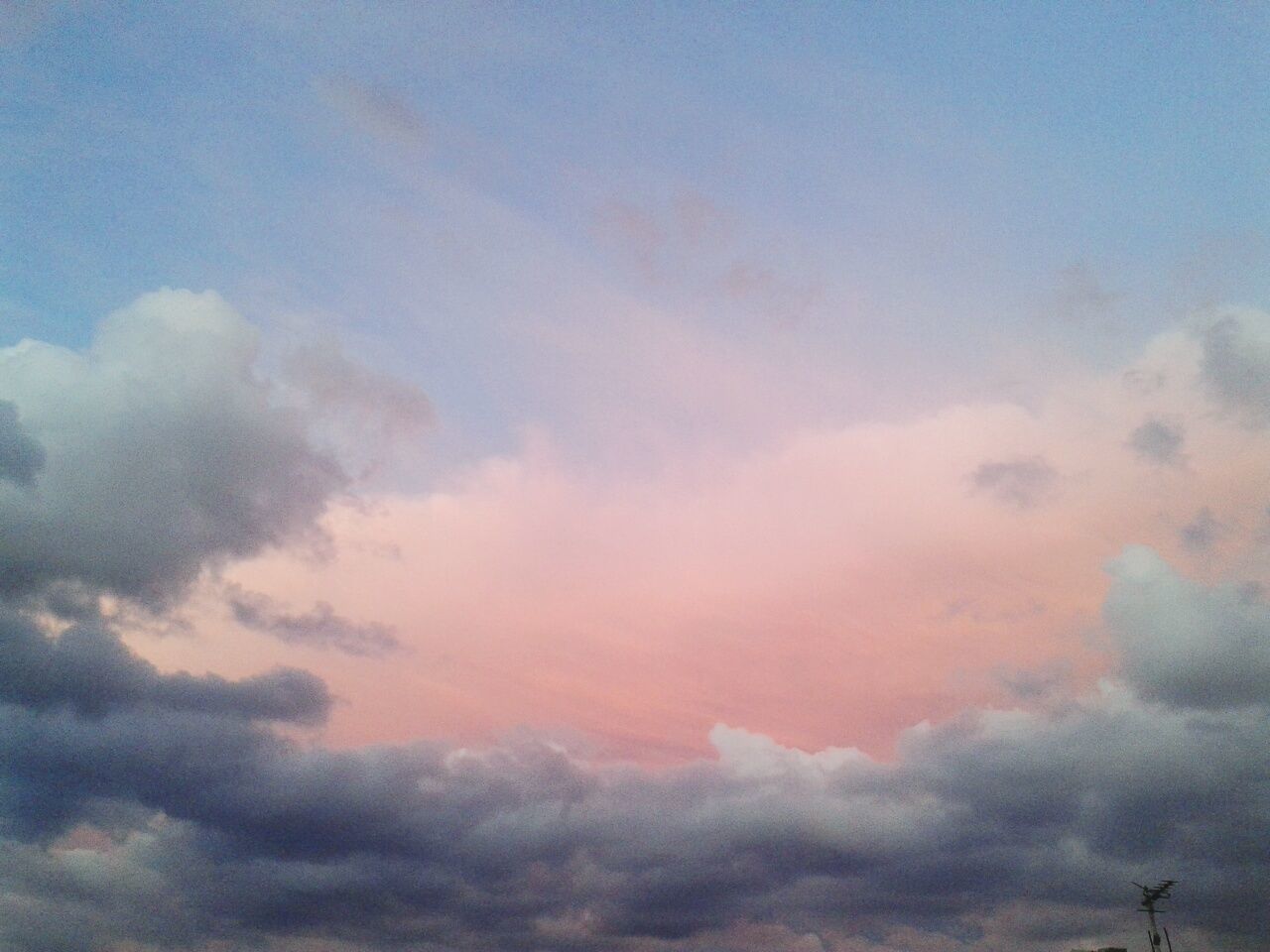 low angle view, beauty in nature, sunset, scenics, tranquility, sky, tranquil scene, nature, cloud - sky, majestic, sky only, cloudscape, idyllic, cloud, orange color, heaven, outdoors, atmospheric mood, blue, meteorology, dramatic sky, cloudy, atmosphere, no people, moody sky, full frame, vibrant color, bright, multi colored, non-urban scene