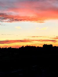 Scenic view of dramatic sky during sunset