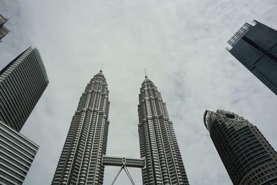 Low angle view of skyscrapers against sky