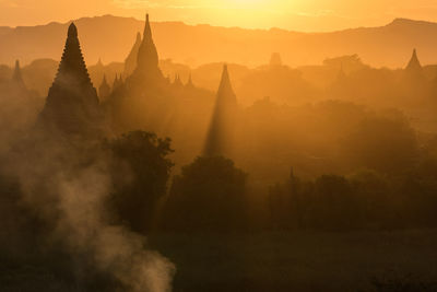 Scenic view of temple against sky during sunset