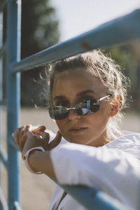 Close-up portrait of boy wearing sunglasses