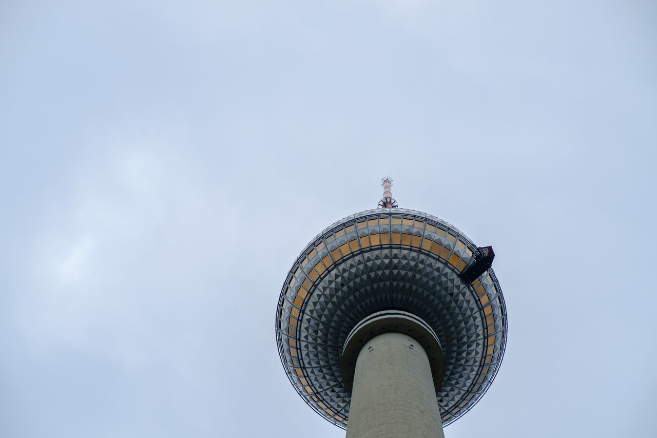 LOW ANGLE VIEW OF COMMUNICATIONS TOWER AGAINST SKY