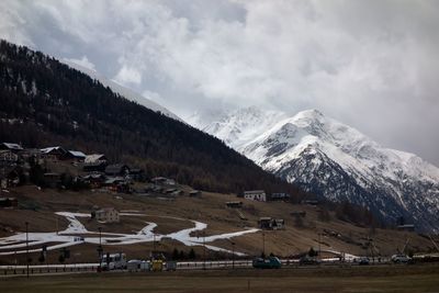 Scenic view of snowcapped mountains against sky