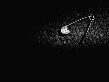 Close-up of object over black background