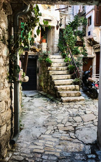 Alley amidst buildings in town