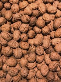 Full frame shot of walnuts for sale at market