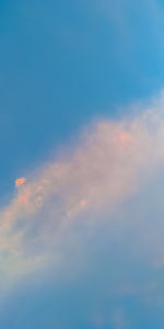 Low angle view of cloudy sky during sunset