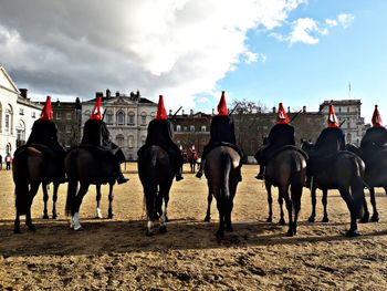 Group of people riding horses