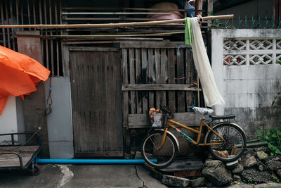 Bicycles parked on street against building