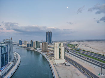 Panoramic view of city buildings against sky