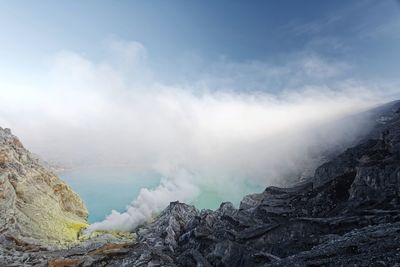 Panoramic view of volcanic landscape against sky