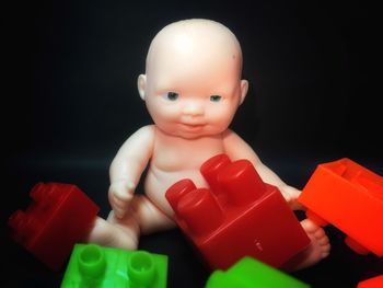 Close-up of stuffed toy against black background