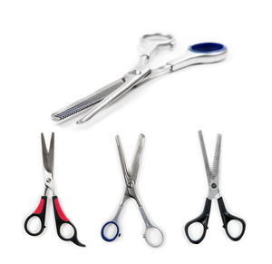 High angle view of various scissors over white background