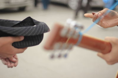 Close-up of woman holding hands