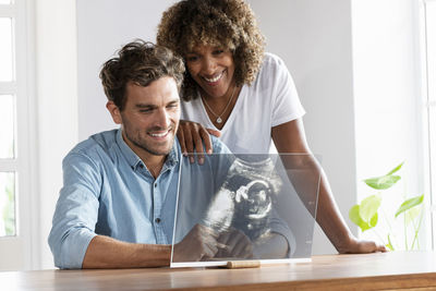 Portrait of a smiling young couple