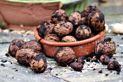 Close-up of nuts on wood