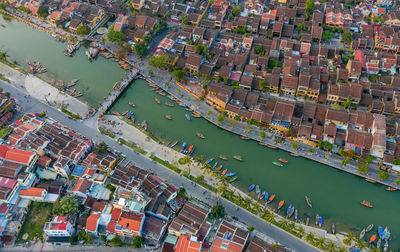 High angle view of river amidst buildings in city