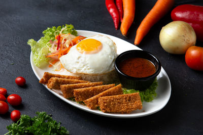 High angle view of breakfast served on table