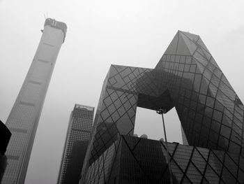 Low angle view of modern buildings against sky