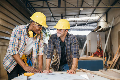 Architects working at construction site