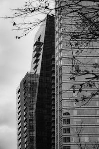 Low angle view of modern buildings against sky