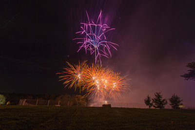 Firework display at night