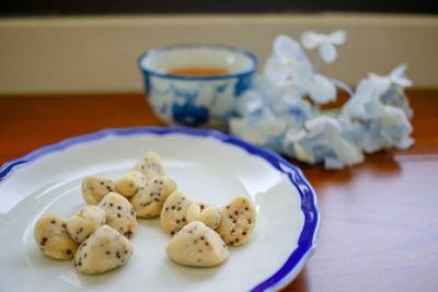 Close-up of cookies in plate on table