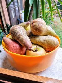 Close-up of fruits in bowl on table