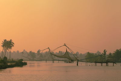 Scenic view of sea at sunset