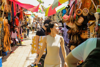 Group of people at market in city