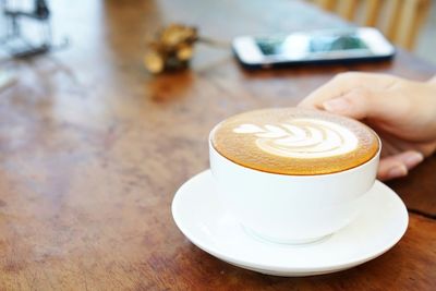 Coffee cup on table