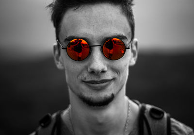 Portrait of young man wearing sunglasses