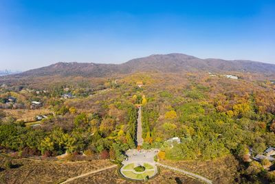 Scenic view of mountains against clear blue sky