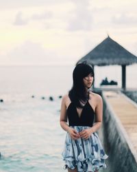 Portrait of young woman looking away