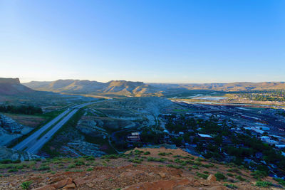 Scenic view of landscape against clear blue sky