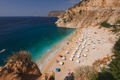 Tourists swimming on the kaputas beach, kas, antalya turkey