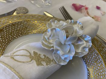 High angle view of white rose on table