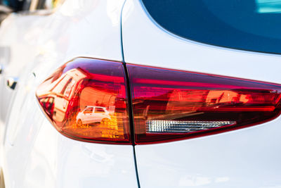 Close-up of reflection on side-view mirror