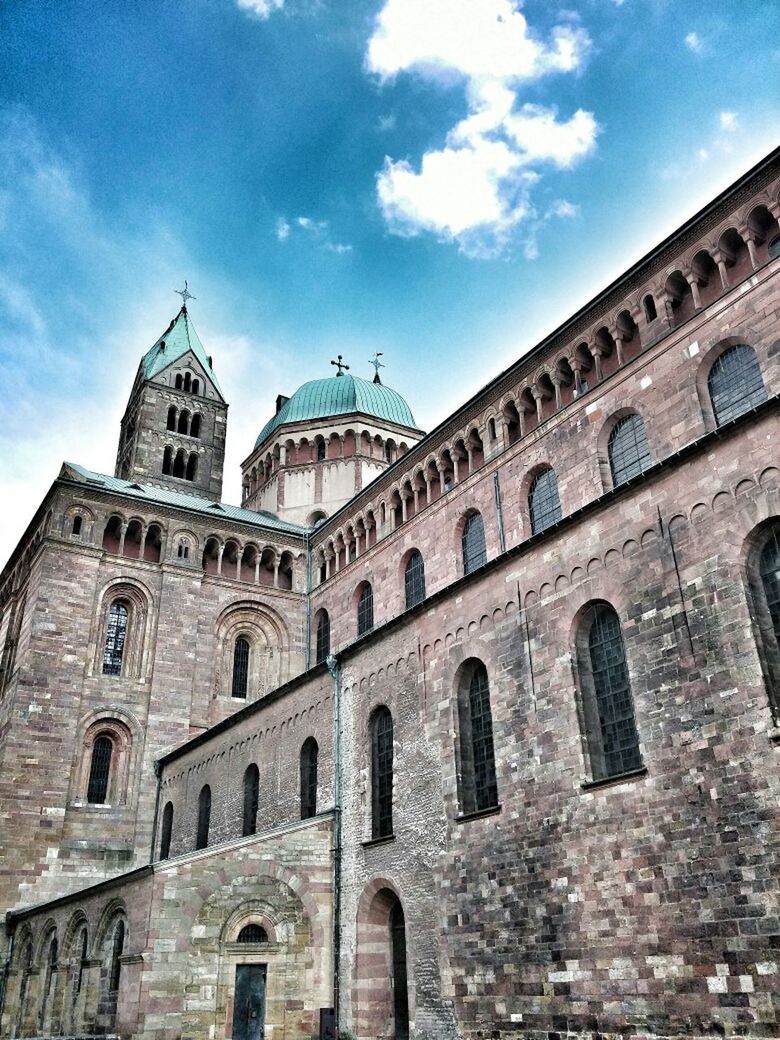 architecture, built structure, building exterior, sky, low angle view, history, old, cloud - sky, the past, travel destinations, arch, cloud, famous place, day, tourism, window, travel, ancient, outdoors, blue