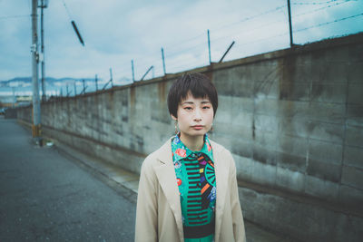 Portrait of boy standing outdoors