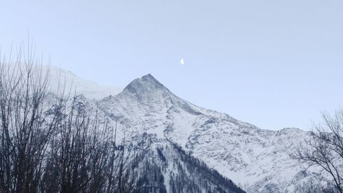 Low angle view of mountain against clear sky